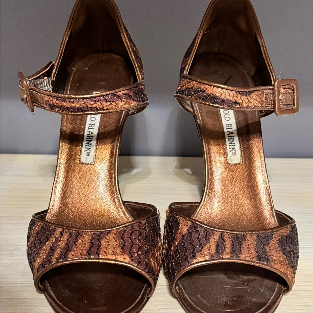 Manolo Blahnik Gold Heels with High Slender Design